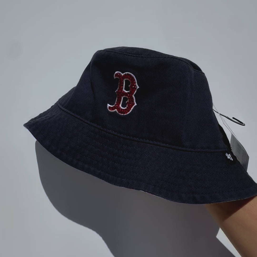 Video of Boston Red Sox baseball bucket hat displaying rhinestones sparkling in the sunlight